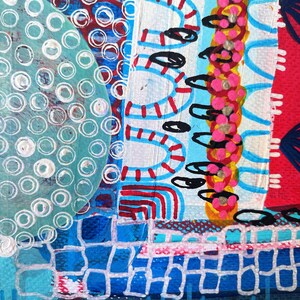 May include: Abstract painting with a mix of blue, red, white, and black paint. The painting features a variety of shapes and patterns, including circles, lines, and dots.