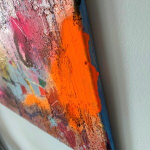 Sides are painted so you can hang it without framing if you like the way it looks