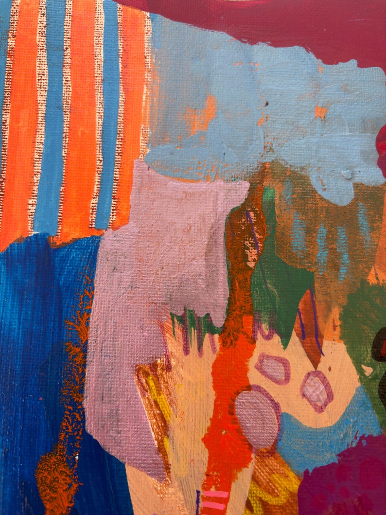 May include: An abstract painting on canvas featuring a vibrant composition of colors including orange and blue vertical stripes, a large light purple shape, patches of deep blue, bright red, soft pink, and dark green, with visible brushstroke textures.