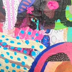 May include: Abstract painting with a colorful, layered design. The painting features pink, blue, yellow, green, and black paint. The paint is applied in a variety of textures, including stripes, dots, and swirls.