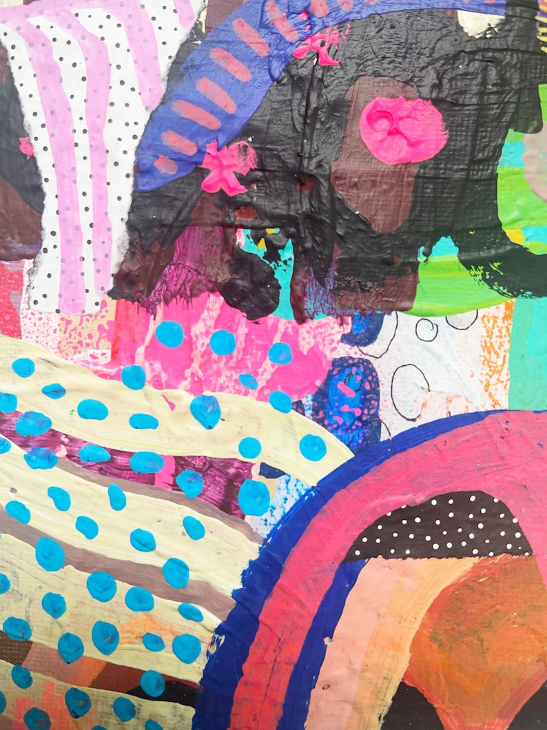 May include: Abstract painting with a colorful, layered design. The painting features pink, blue, yellow, green, and black paint. The paint is applied in a variety of textures, including stripes, dots, and swirls.