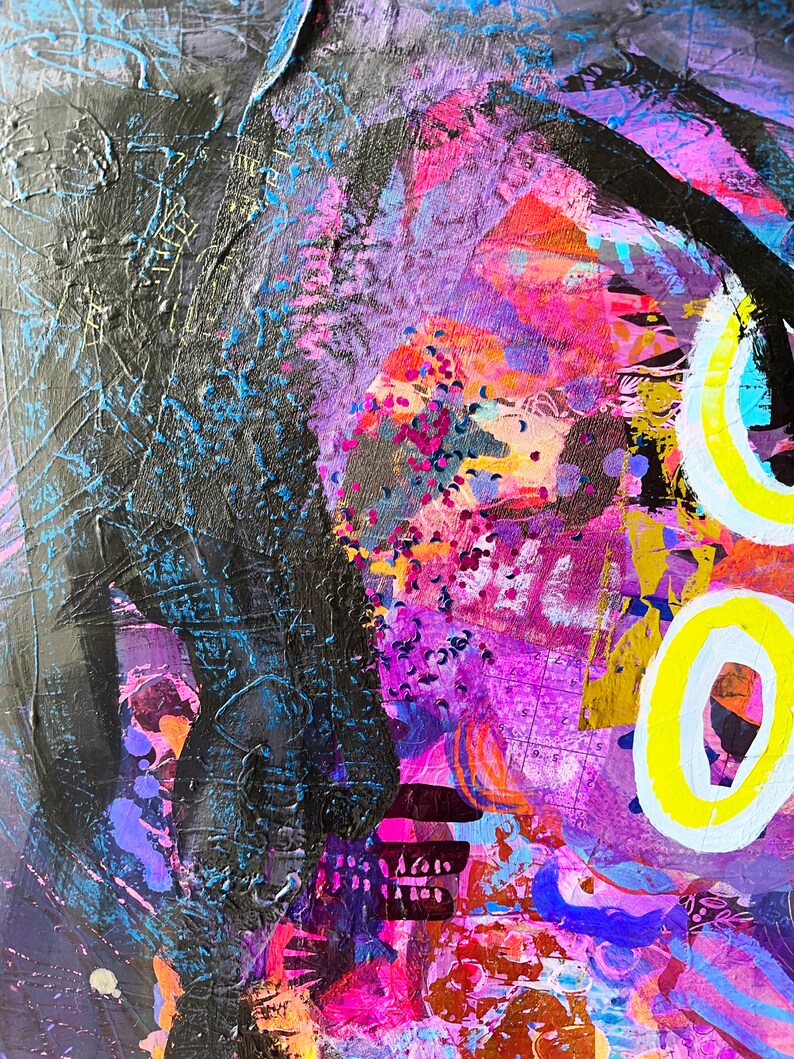 May include: Abstract painting with vibrant colours, including pink, purple, blue, yellow, and black. The painting features a large black shape on the left side of the image, and a yellow circle with a white outline on the right side of the image.