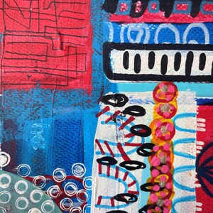 May include: Abstract painting with a mix of blue, red, white, black, yellow, and pink colors. The painting features geometric shapes, lines, and circles.