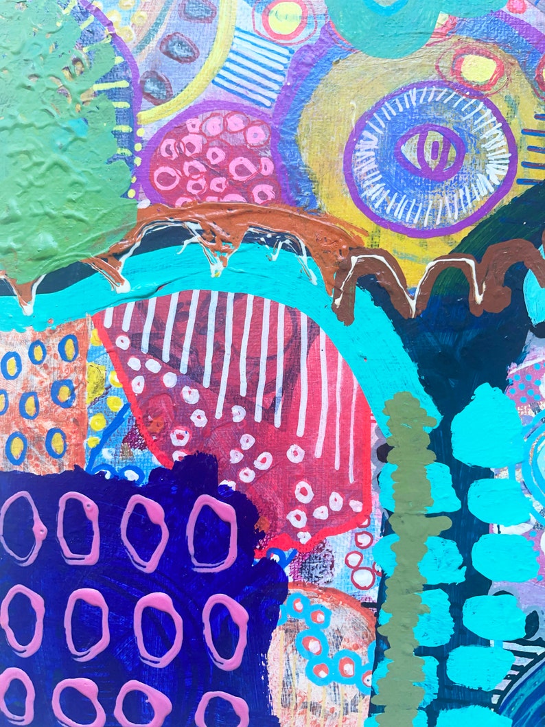 May include: Abstract painting with a colorful, layered design. The painting features a variety of shapes, including circles, ovals, and stripes. The colors used in the painting include blue, green, red, yellow, and pink.