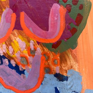 May include: An abstract painting on canvas featuring layered brushstrokes in vibrant colors including bright orange, deep purple, light blue, olive green, and yellow. The composition displays thick, textured paint applications with curved lines and dotted patterns.