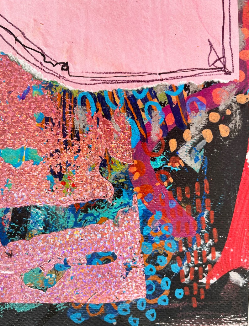 May include: Abstract mixed media artwork with a pink background and layered textures. The piece features torn paper, glittery pink sections, and areas of blue, orange, and black paint. Black line drawings and dotted patterns add detail.