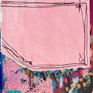 May include: Abstract mixed media artwork with a pink rectangular shape outlined in black, set against a backdrop of vibrant colours. The artwork features torn paper edges and a textured surface with splashes of blue, red, and yellow.