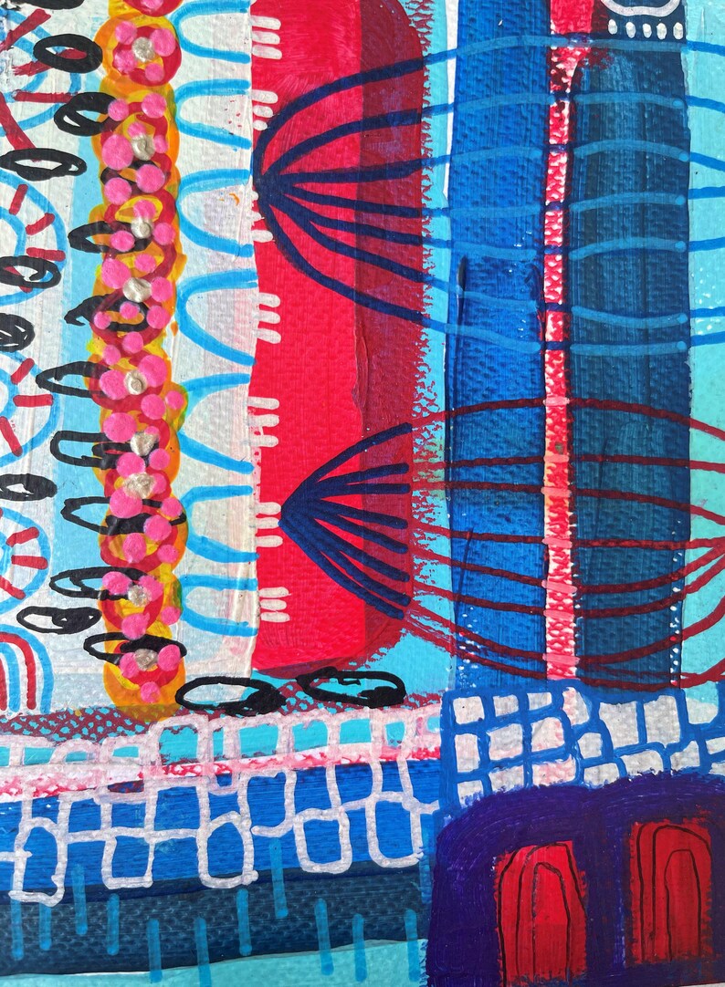 May include: Abstract painting with a mix of blue, red, pink, white, and black paint. The painting has a geometric pattern and a variety of textures.