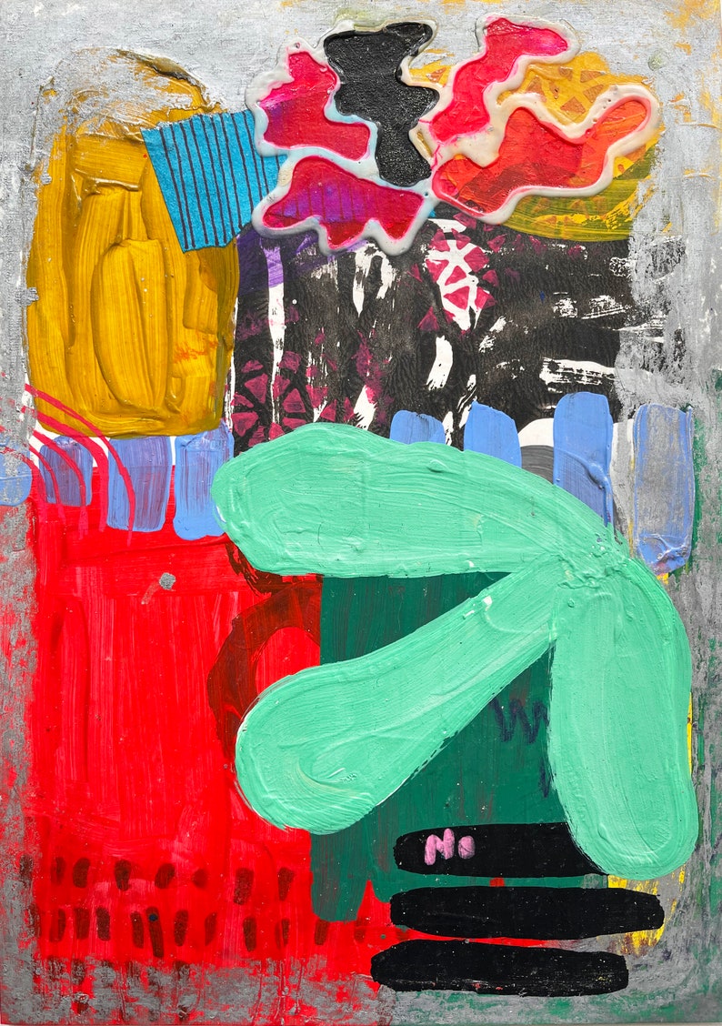 May include: Abstract painting with bold strokes of red, yellow, green, blue, and black paint. The painting features a large green shape in the center and a smaller red shape in the upper right corner.