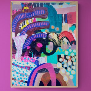 May include: Abstract painting with a colorful, layered design. The painting features a mix of geometric shapes, dots, and lines in shades of pink, blue, green, yellow, and brown. The painting is framed in a wooden frame.