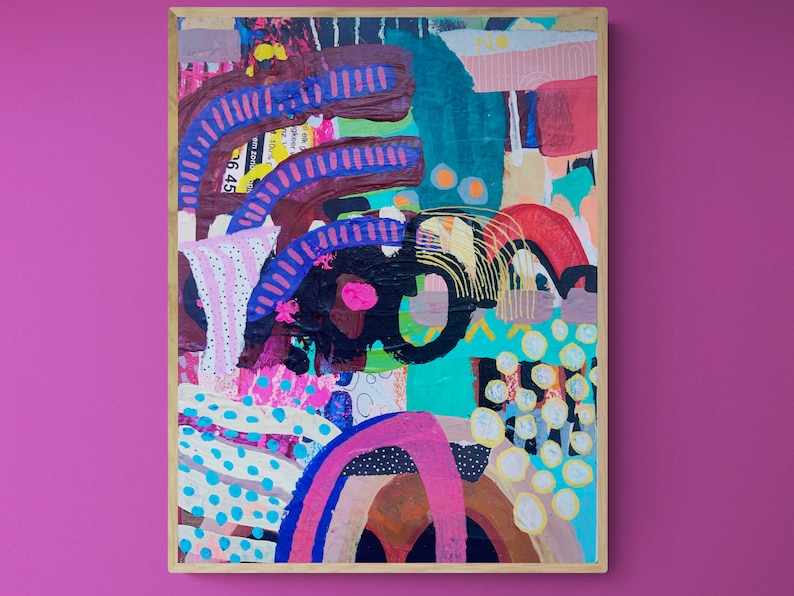 May include: Abstract painting with a colorful, layered design. The painting features a mix of geometric shapes, dots, and lines in shades of pink, blue, green, yellow, and brown. The painting is framed in a wooden frame.