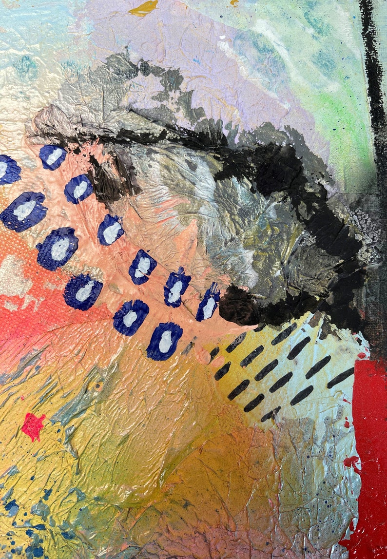 May include: Abstract painting with a mix of textures and colors, including black, white, blue, pink, and gold. The painting features a large black shape in the upper right corner, with a series of blue and white dots scattered across the lower left corner.