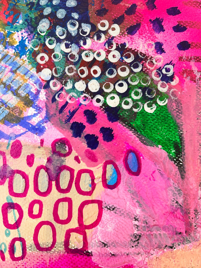 May include: Abstract painting with pink, green, blue, and white paint. The painting features a variety of shapes and patterns, including circles, dots, and lines.