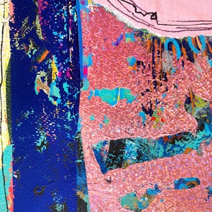 May include: Abstract mixed media artwork with a vibrant colour palette. The composition features layered textures in shades of pink, blue, and black. The artwork incorporates torn paper and glitter, creating a dynamic and textured surface.