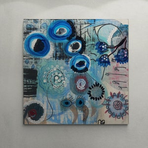 May include: Abstract painting featuring blue, black, white and red colours. The painting incorporates swirling patterns, circles and dots. The painting is on a canvas.