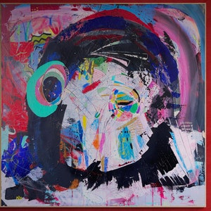 May include: Abstract painting with a black, blue, and green circular design in the upper left corner. The background is a mix of pink, red, white, and blue.