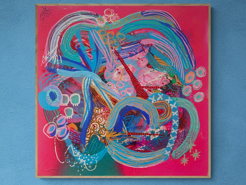 May include: Abstract painting on canvas with a pink background and colorful swirls, lines, and dots. The painting features shades of blue, green, pink, and gold.