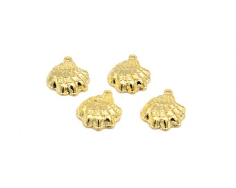 May include: Four gold-colored metal seashell charms. Each charm has a detailed, textured design.