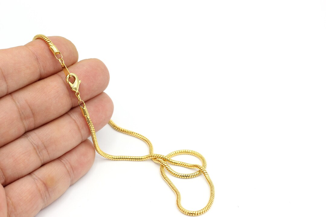 DJADEE Collana a serpente Snake con placcatura in oro 24 carati, impermeabile, larghezza 1,2-3 mm, lunghezza 40-80 cm, ipoallergenica, in ottone, per uomo e bambino, in oro chiaro 24 carati, 1,2 mm x