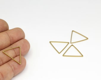 May include: Four gold-coloured triangle-shaped metal hoops. The hoops are approximately 2.5 cm in diameter.