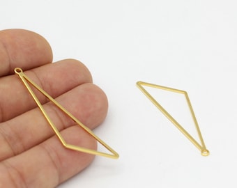 May include: Two gold-toned metal triangle shapes with a loop at the top. The triangle shapes are open and have a wire-like appearance.