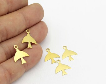 May include: Five gold-colored metal bird charms with a loop at the top for attaching to jewelry or other crafts.