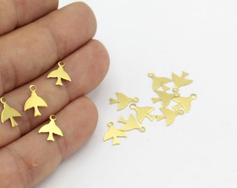 May include: A group of gold-colored metal bird charms with a loop for attaching to jewelry or other crafts.