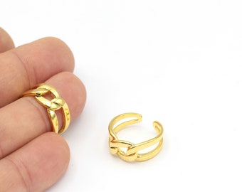 May include: Two gold-toned rings with a chain-link design. The rings are open and adjustable.