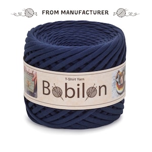 May include: A spool of navy blue t-shirt yarn, labelled "T-Shirt Yarn Bobilon".