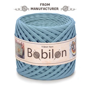 May include: A skein of light blue t-shirt yarn, labelled "Bobilon" and "T-Shirt Yarn".