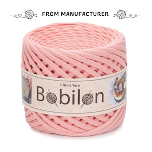 May include: A pink ball of T-Shirt Yarn by Bobilon. The yarn is made from recycled t-shirts and is perfect for crocheting or knitting.