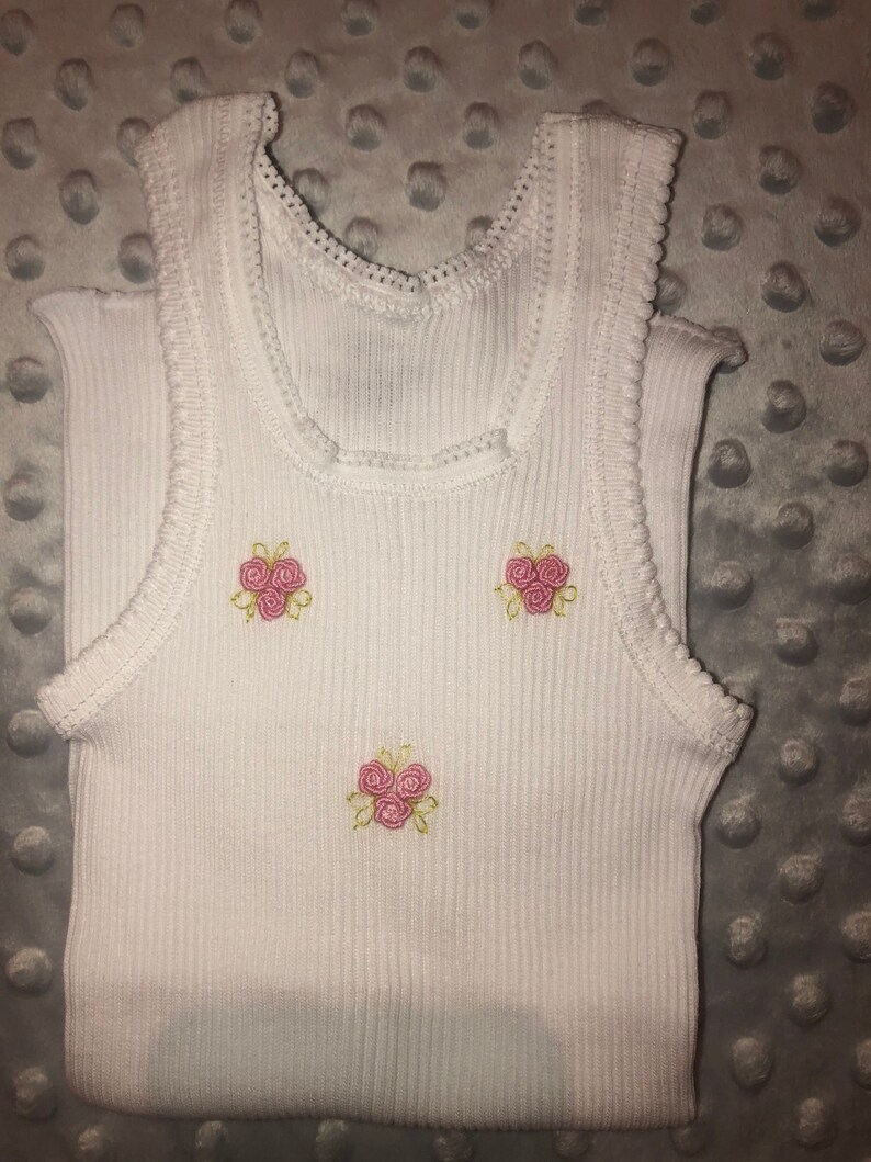 Embroidered baby Singlets size 0