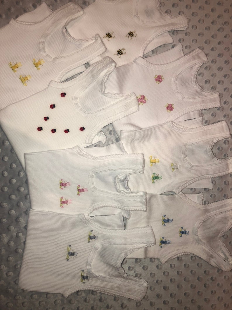 Embroidered baby Singlets size 0