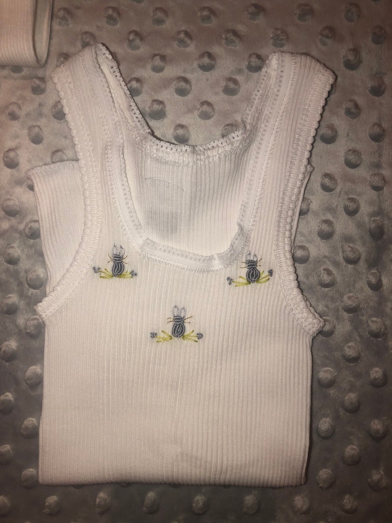 Embroidered baby Singlets size 0