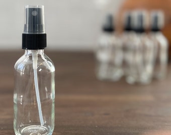 2 oz. (60 ML) Clear Boston Round Glass Bottle with Black Fine Mist Sprayer - Aromatherapy / Essential Oils / Perfumes / Face Oils