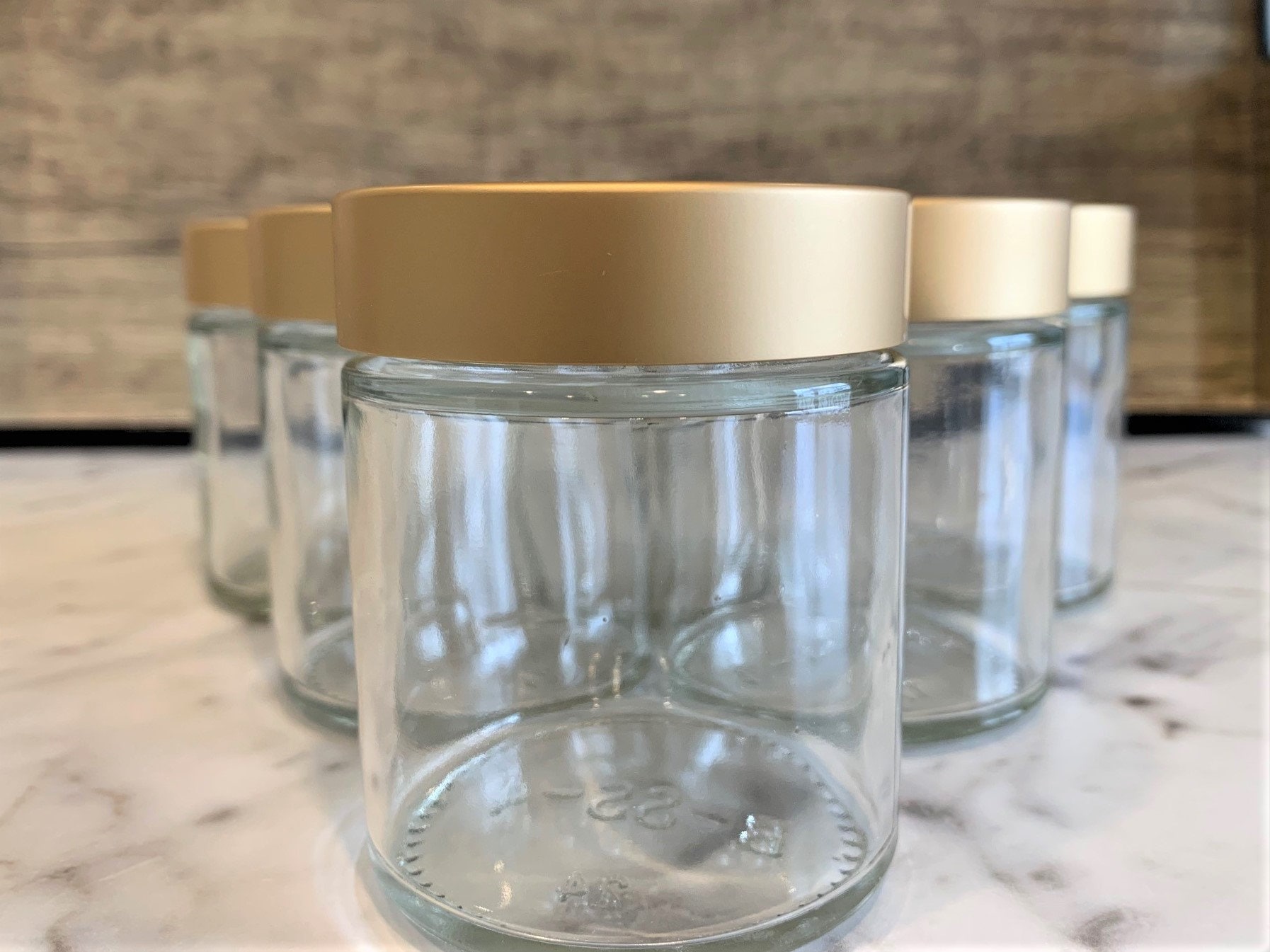 16 oz Clear Glass Beverage Bottles w/ Gold Metal Lugs Caps