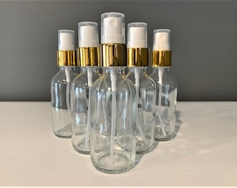 2 oz. (60 ML) Clear Boston Round Glass Bottle with Gold Fine Mist Sprayer | Great for serums | Essential Oils | Face Oils | Perfumes