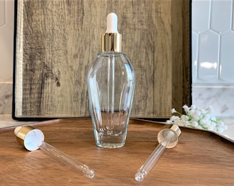 1.7 oz. Tear Drop Clear Glass Bottle with Gold Glass Dropper | Perfect for your essential oils & skin care products | Perfume Bottle