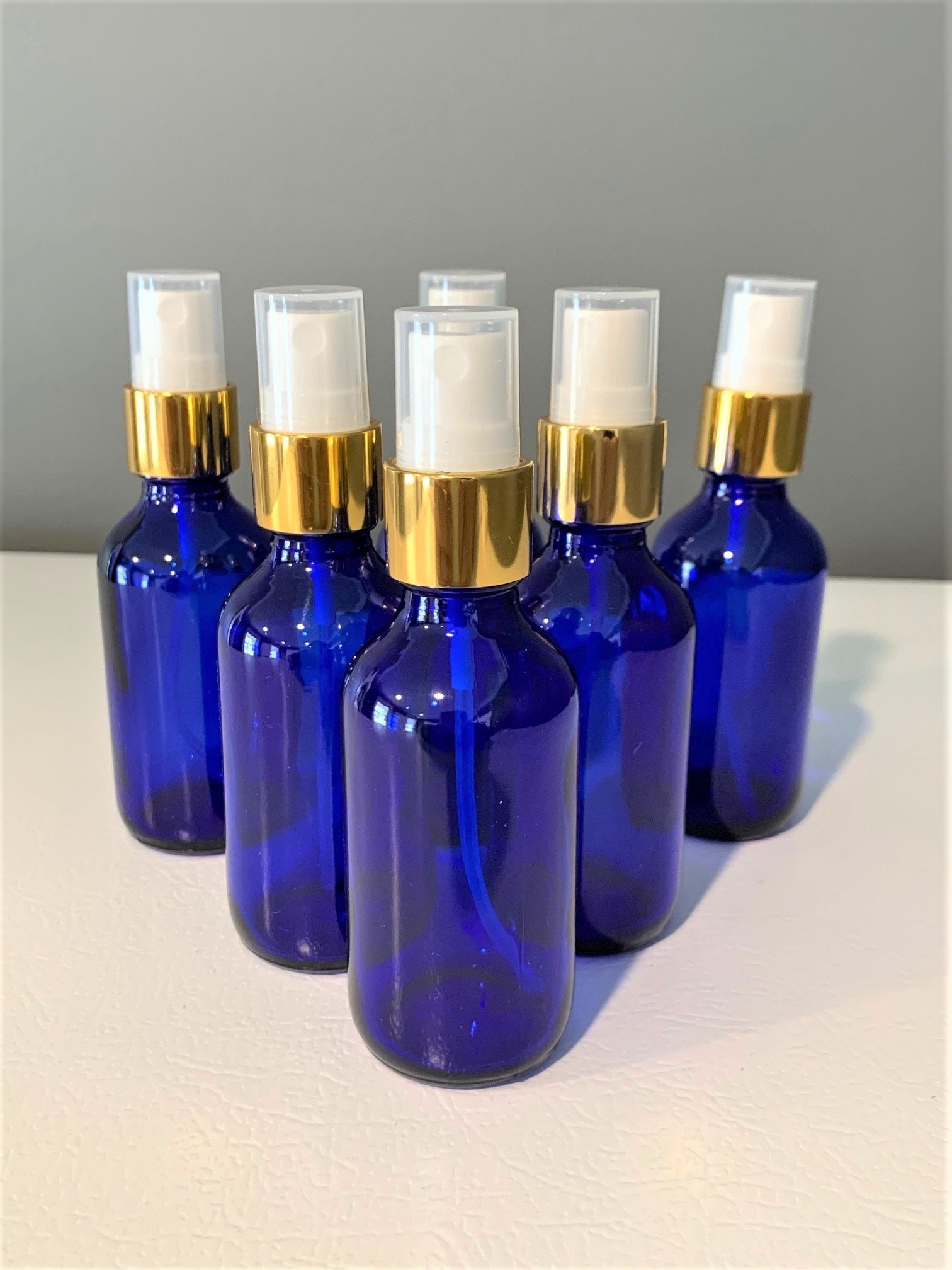 1oz Amber Glass Boston Round Bottle 20-400 - Liquid Bottles LLC