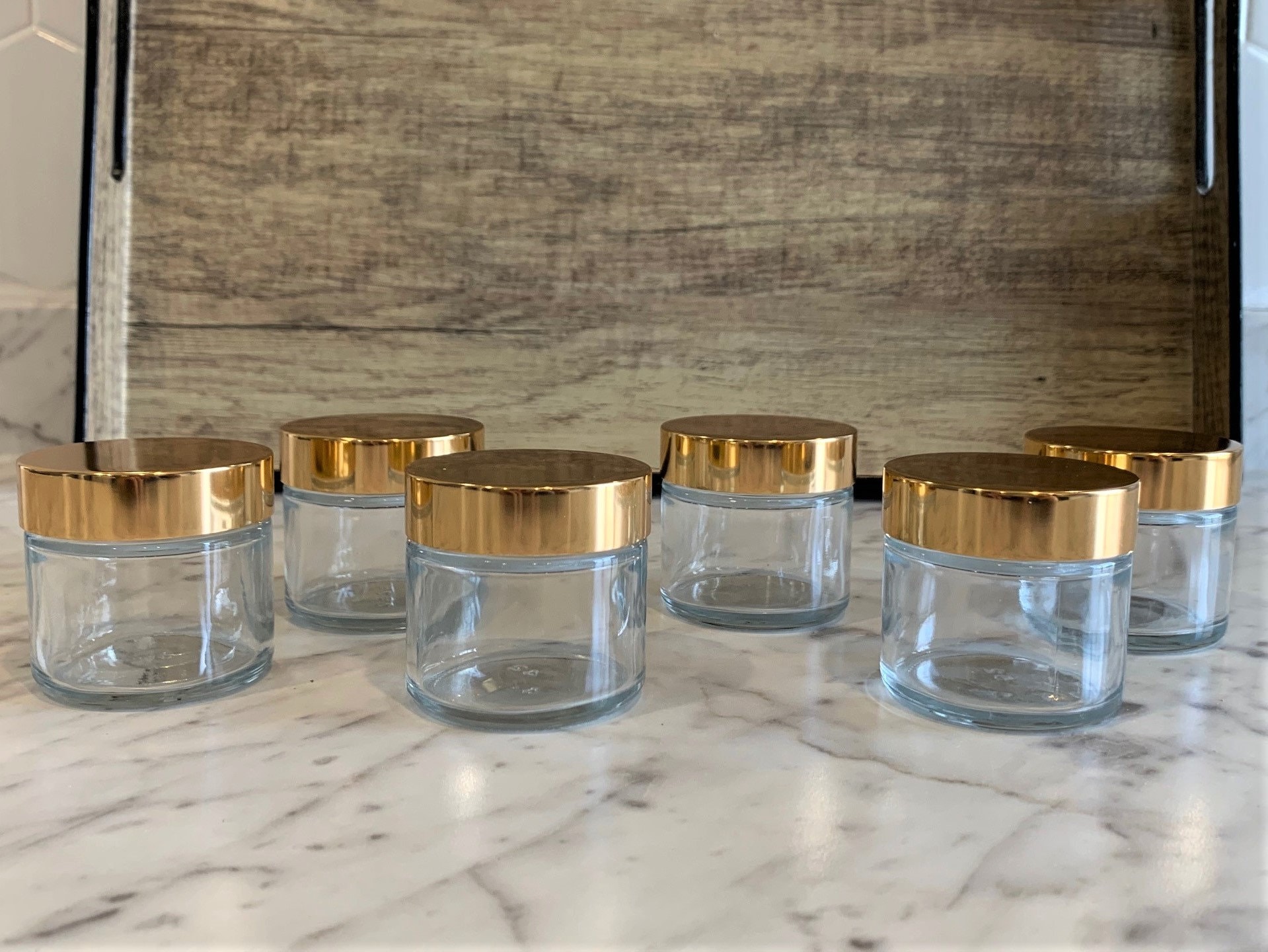 Conjunto de envases de vidrio personalizados con fabricantes de tapas  doradas, proveedores, fábrica - envases de vidrio de alta calidad con tapa  dorada en stock - Penghuang