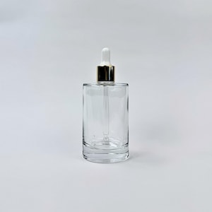 2.0 oz. Clear Glass Cylinder Bottle with Gold Glass Dropper | Perfect for your essential oils & skin care products