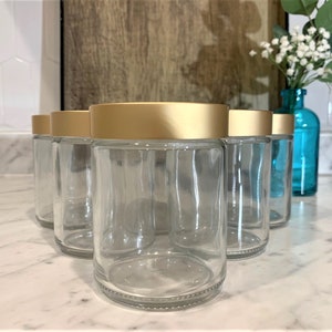 8 oz. Clear Glass Jar Straight Sided with Brushed Gold Lid Perfect for your beauty products. Add a touch of elegance to your products image 1