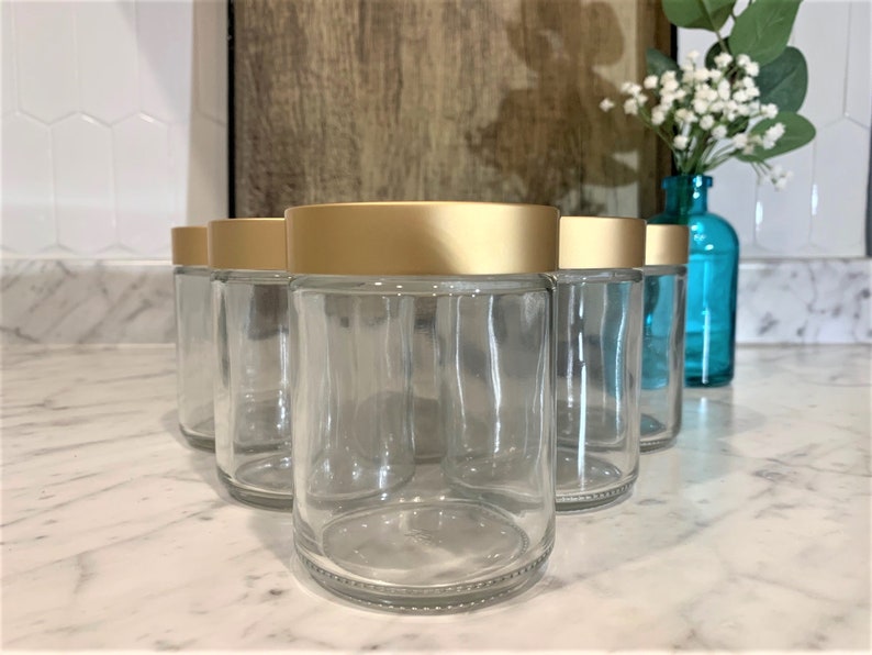 8 oz. Clear Glass Jar Straight Sided with Brushed Gold Lid Perfect for your beauty products. Add a touch of elegance to your products image 1