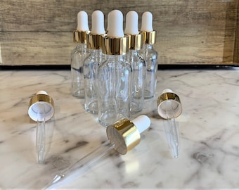 Clear Boston Round Glass Bottle: Gold Dropper, Essential Oils (1 oz / 30 ML)