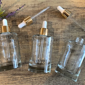 3.4 oz. Deluxe Cylinder Clear Glass Bottle with Gold Glass Dropper | Perfect for your essential oils & skin care products