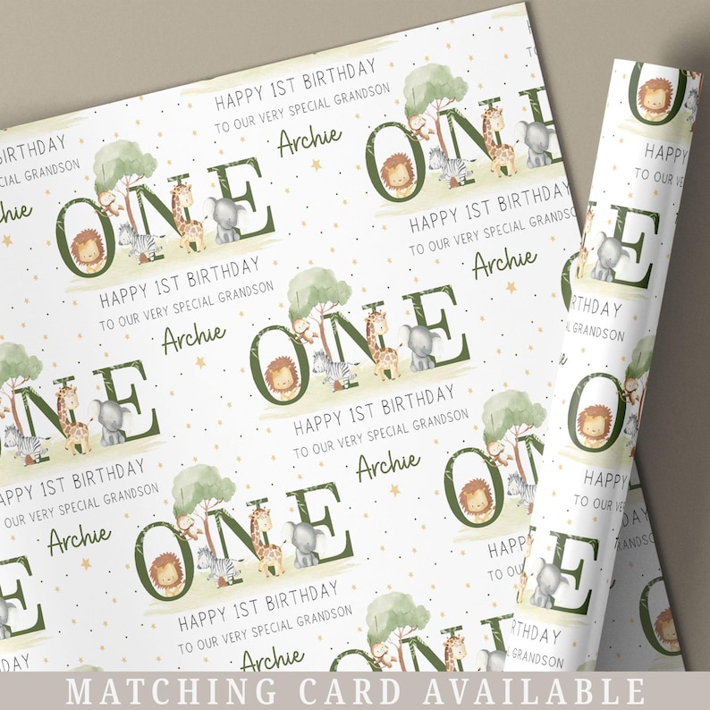 May include: White wrapping paper with a green and brown jungle animal theme. The paper features the word "ONE" repeated throughout the design. The text "Happy 1st Birthday to our very special grandson Archie" is repeated throughout the design.