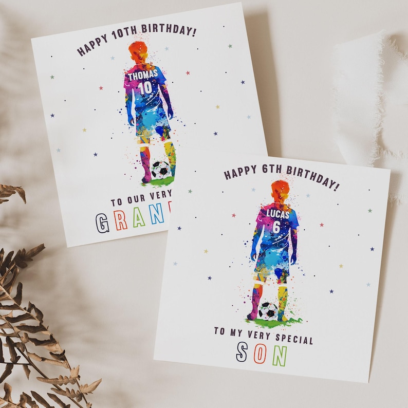 May include: Two personalized birthday cards featuring a watercolor-style illustration of a soccer player. The cards are white with colorful stars and text. The top card says "Happy 10th Birthday!" with the name "Thomas" and the number "10" on the player's jersey. The bottom card says "Happy 6th Birthday!" with the name "Lucas" and the number "6" on the player's jersey. The text on the top card says "To our very Gran". The text on the bottom card says "To my very special Son".