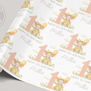 May include: Pink and yellow wrapping paper with a repeating pattern of a cartoon elephant holding a balloon and the text "Happy 1st Birthday Millie".