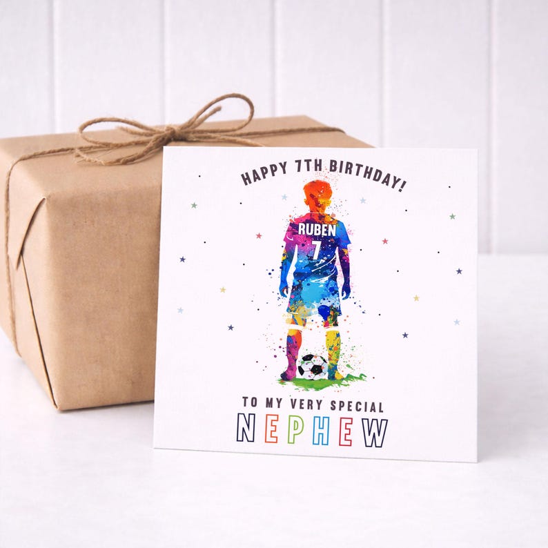 May include: A birthday card with a watercolor illustration of a soccer player in a blue jersey with the name "Ruben" and the number 7. The card reads "Happy 7th Birthday!" and "To My Very Special Nephew."
