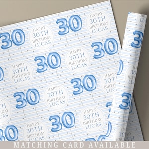 May include: Blue and white wrapping paper with a repeating pattern of blue balloon number 30s and the text "Happy 30th Birthday Lucas".